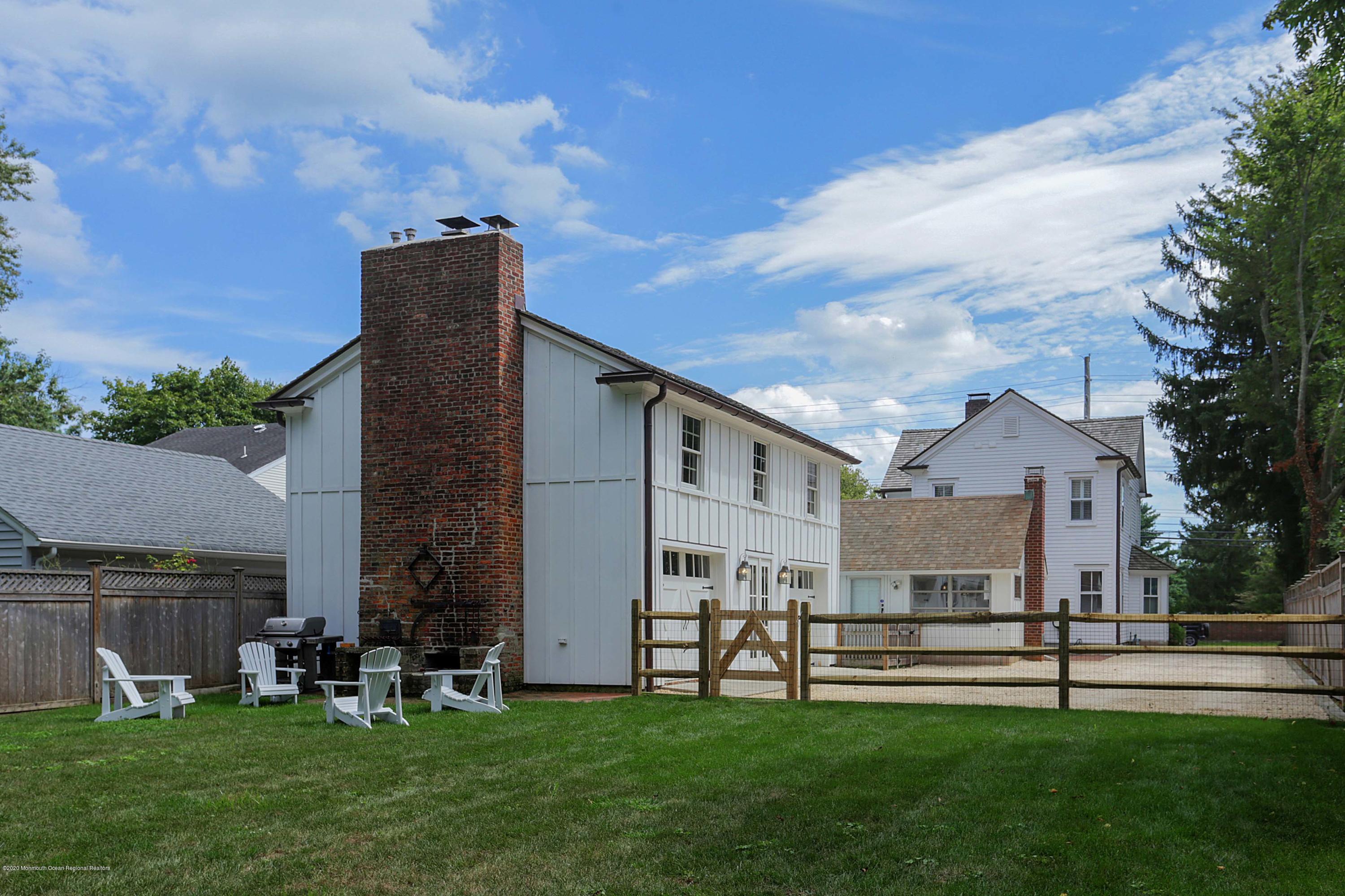 189 Rumson Road Little Silver, NJ 07739 - Photo 25 of 30 a view of house with a big yard and sitting area