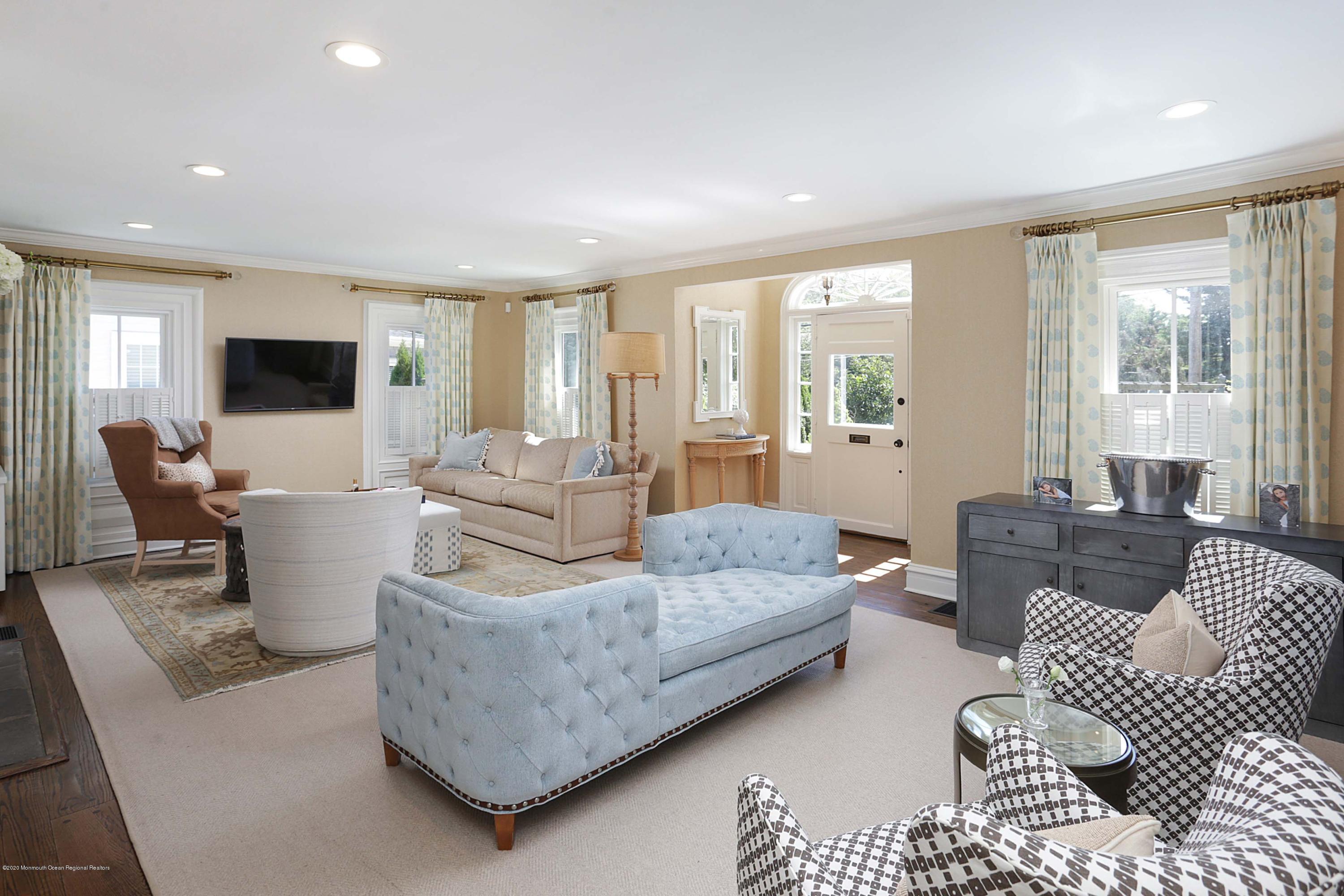 189 Rumson Road Little Silver, NJ 07739 - Photo 3 of 30 a living room with furniture and a flat screen tv
