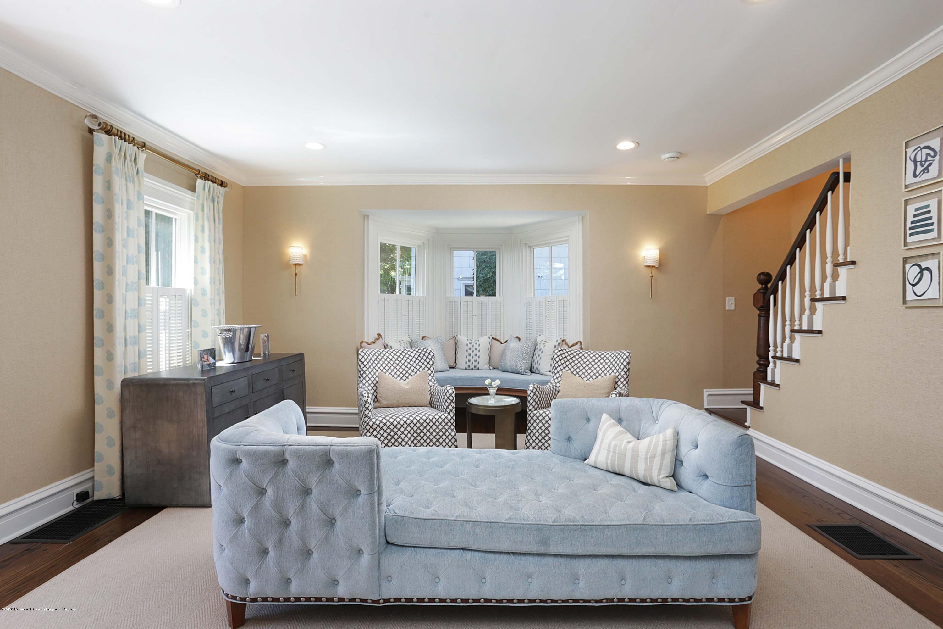 189 Rumson Road Little Silver, NJ 07739 - Photo 4 of 30 a living room with furniture and a potted plant