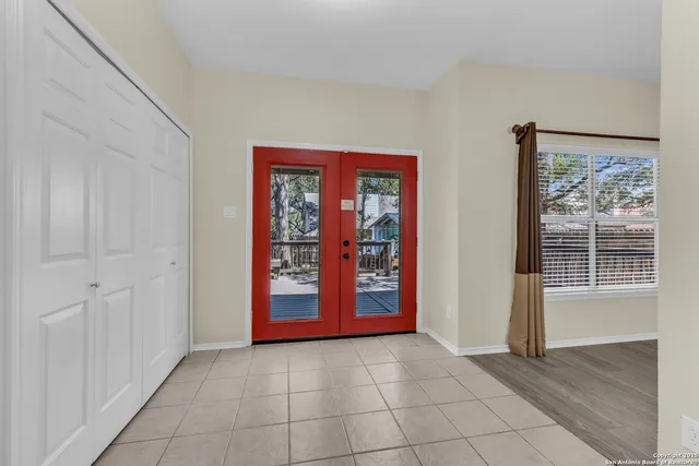 a view of an empty room with window