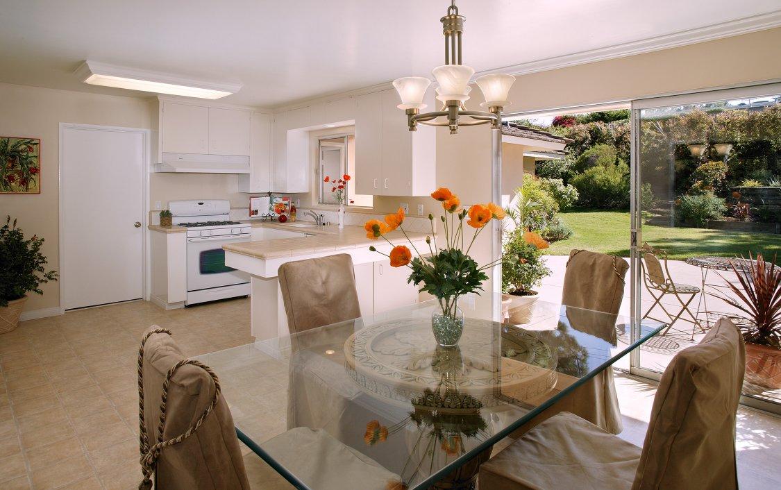 465 North Turnpike Road Santa Barbara, CA 93111 - Photo 3 of 3 a view of a dining room with furniture a chandelier and large windows
