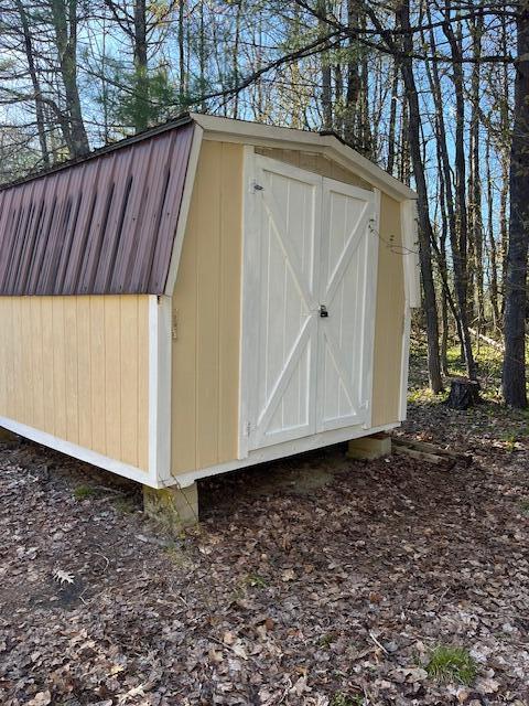 45 Blind Road Livermore Falls, ME 04254 - Photo 11 of 45 1-FrontShed-rear