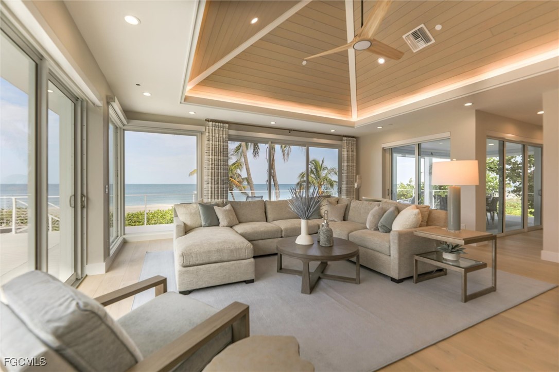 941 South Seas Plantation Road Captiva, FL 33924 - Photo 12 of 50 a living room with furniture and a large window