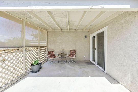 1233 Mayo Street Ridgecrest, CA 93555 - Photo 30 of 32 a view of a living room and a garage