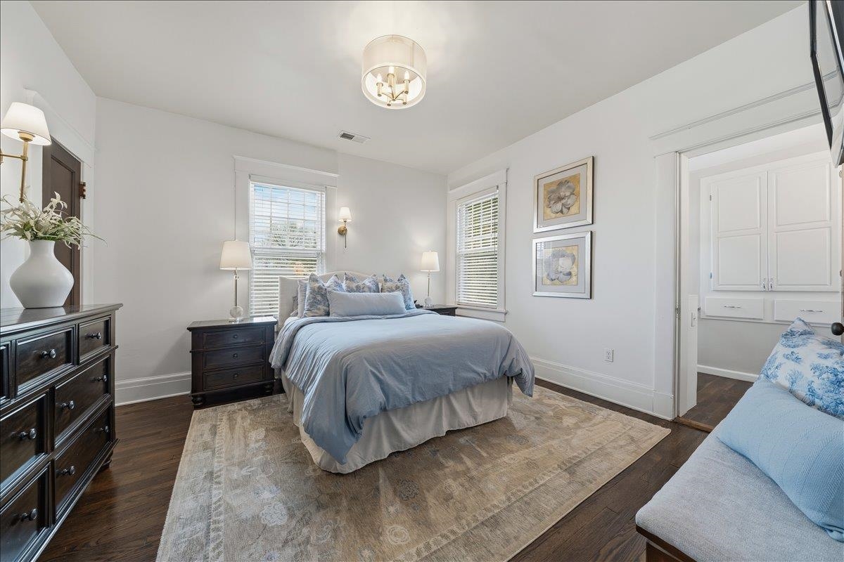 124 Clark Place Memphis, TN 38104 - Photo 21 of 40 a bedroom with a bed and wooden floor
