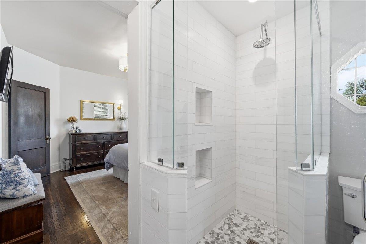 124 Clark Place Memphis, TN 38104 - Photo 24 of 40 a bathroom with a granite countertop shower a sink and a mirror
