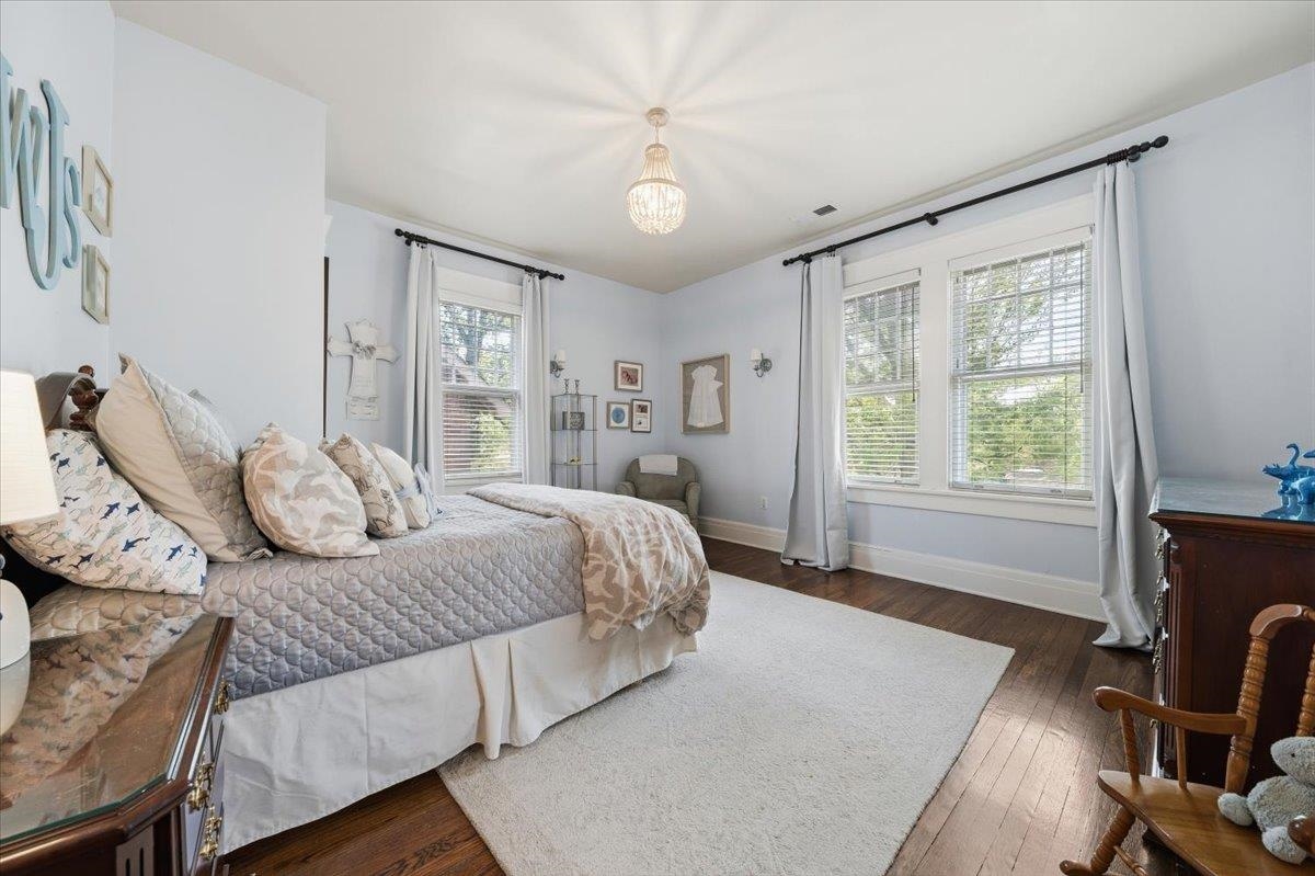 124 Clark Place Memphis, TN 38104 - Photo 28 of 40 a bedroom with a bed and a desk