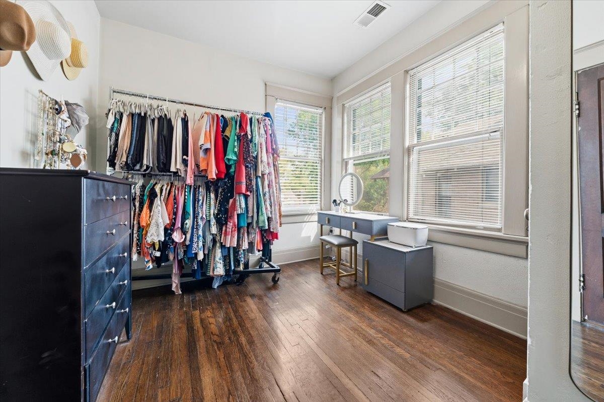 124 Clark Place Memphis, TN 38104 - Photo 30 of 40 a view of walk in closet with clothes and shoes