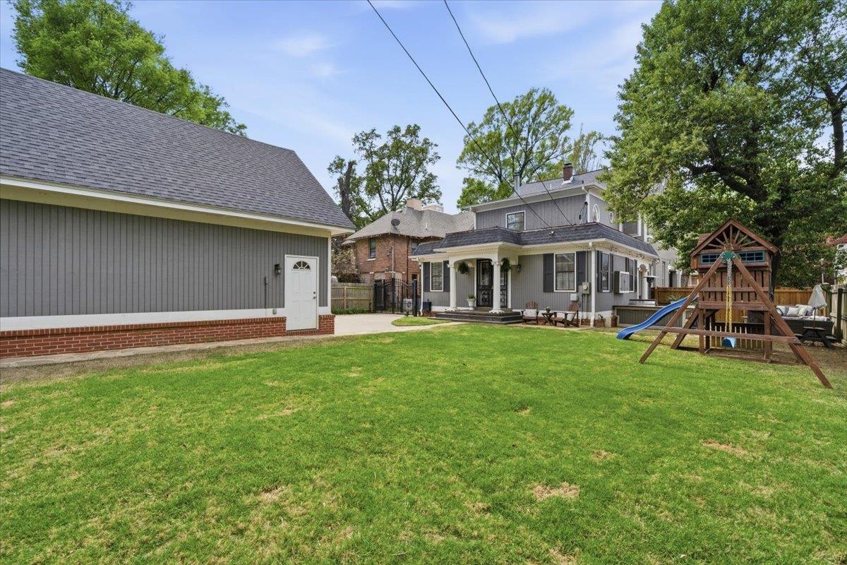 124 Clark Place Memphis, TN 38104 - Photo 37 of 40 a view of a house with a yard and sitting area