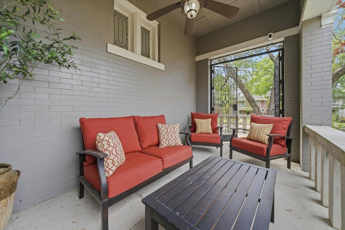 124 Clark Place Memphis, TN 38104 - Photo 6 of 40 a outdoor living space with furniture and a potted plant