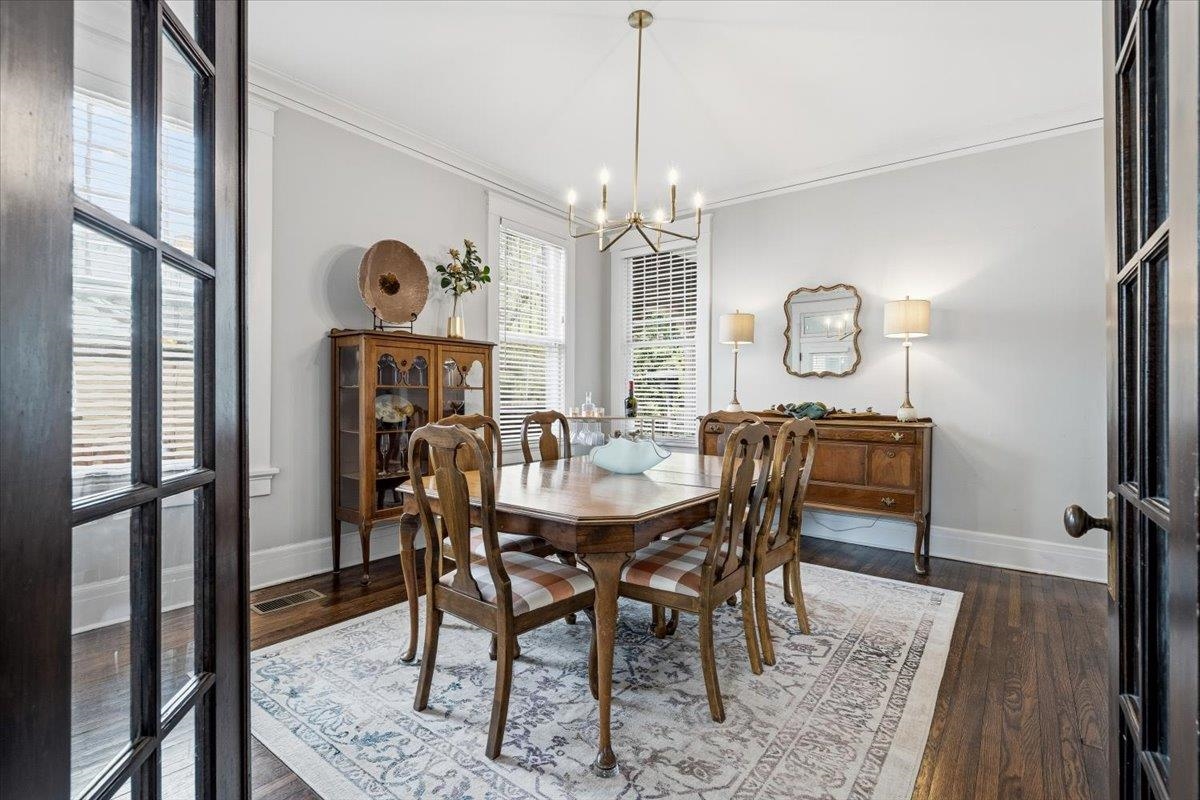 124 Clark Place Memphis, TN 38104 - Photo 9 of 40 a view of a dining room with furniture window and wooden floor