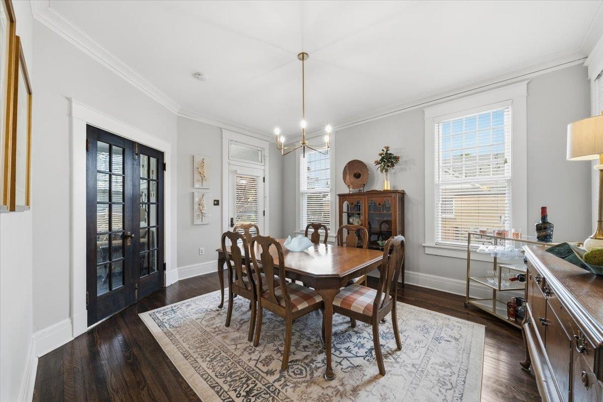 124 Clark Place Memphis, TN 38104 - Photo 10 of 40 a view of a dining room with furniture window and wooden floor