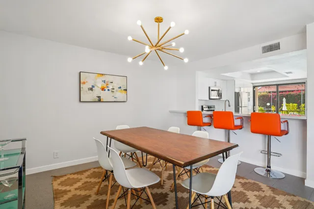 a view of a dining room with furniture