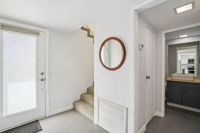 a view of a bedroom from a hallway