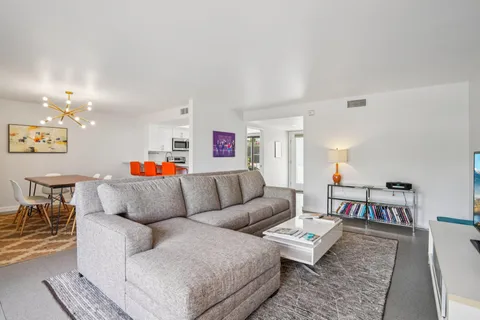 a living room with furniture and a couch