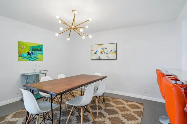 a view of a dining room with furniture