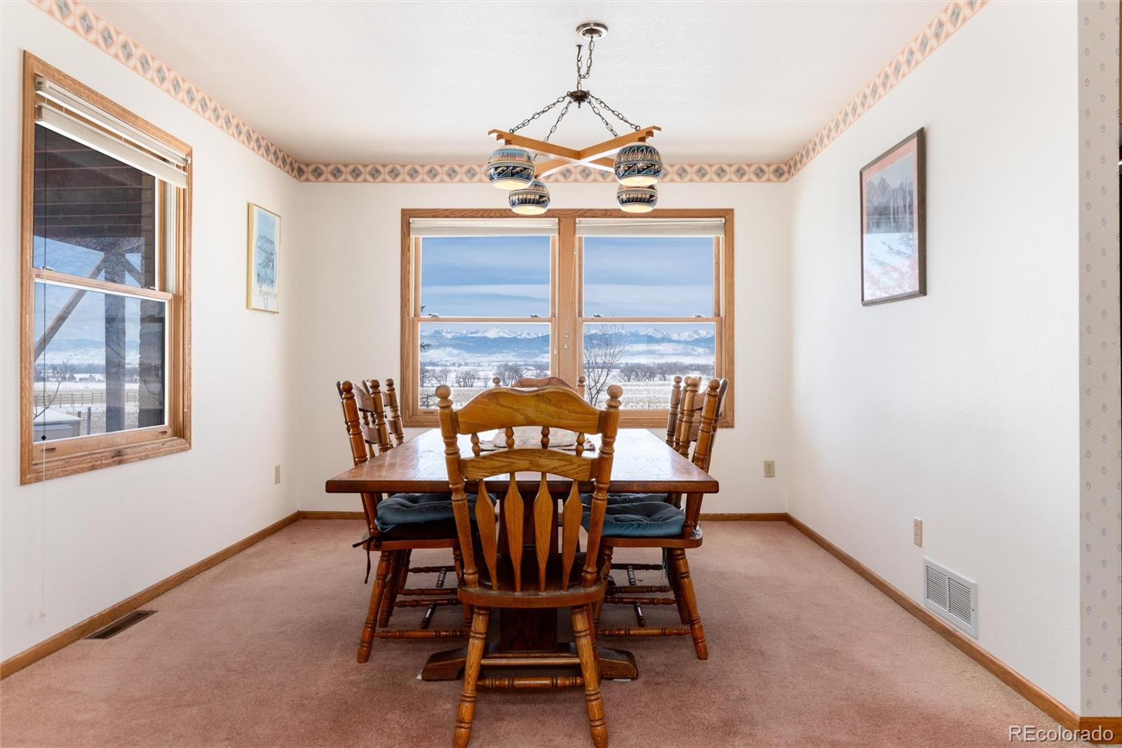 10650 Yellowstone Road Longmont, CO 80504 - Photo 13 of 43 a dining room with furniture and window