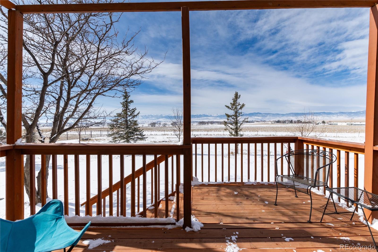 10650 Yellowstone Road Longmont, CO 80504 - Photo 20 of 43 a view of a porch with a backyard