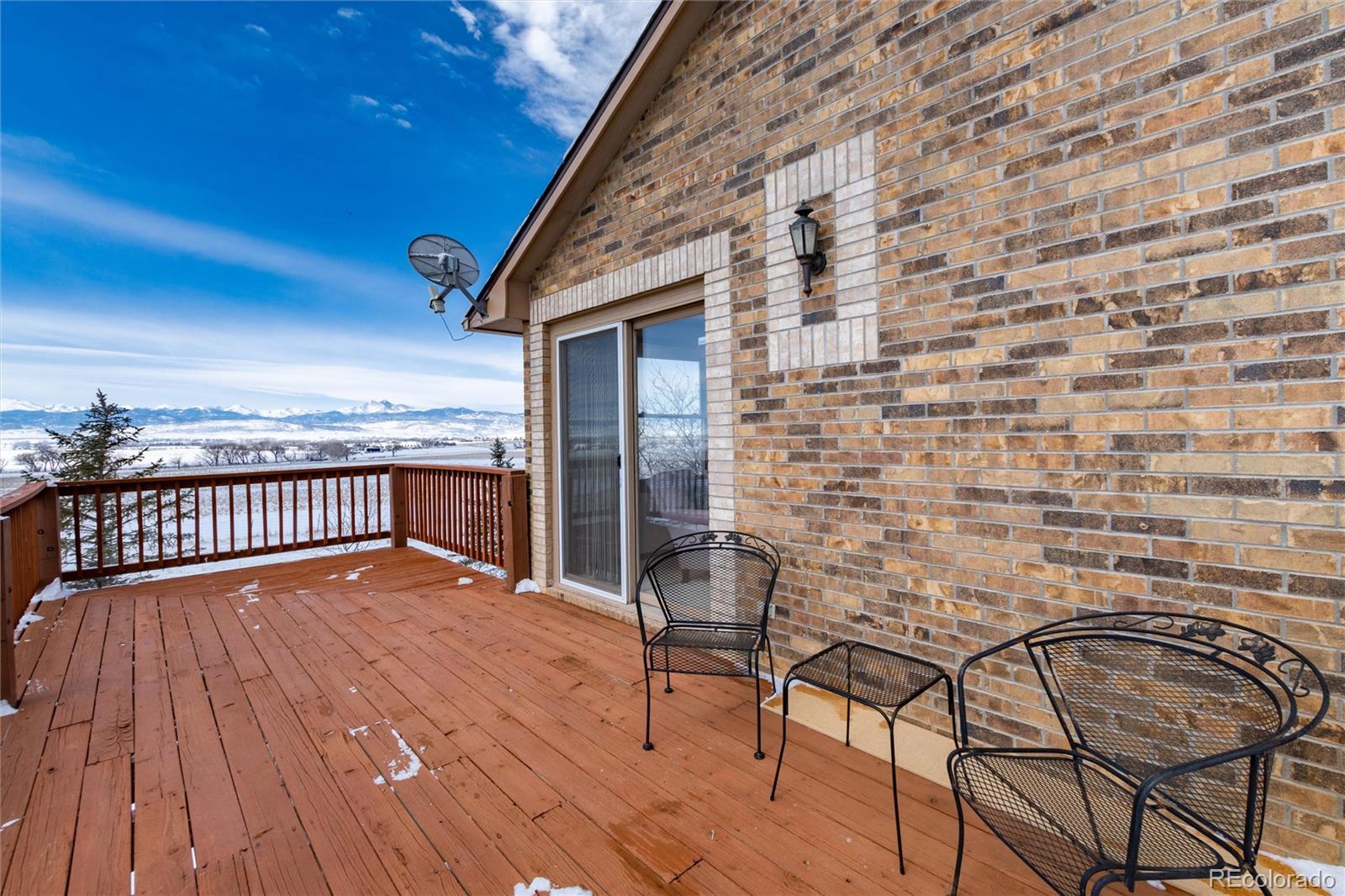 10650 Yellowstone Road Longmont, CO 80504 - Photo 25 of 43 a balcony with chairs