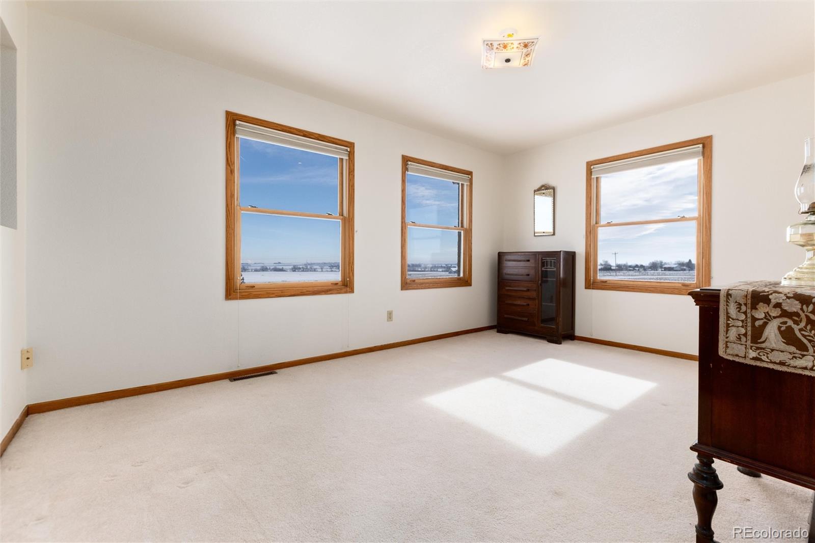 10650 Yellowstone Road Longmont, CO 80504 - Photo 27 of 43 a view of an empty room with a window