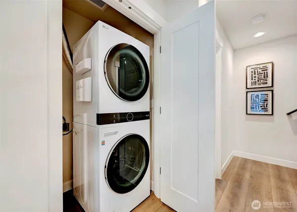 a utility room with dryer and washer