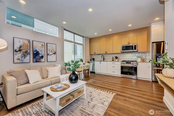a living room with furniture fireplace and a flat screen tv