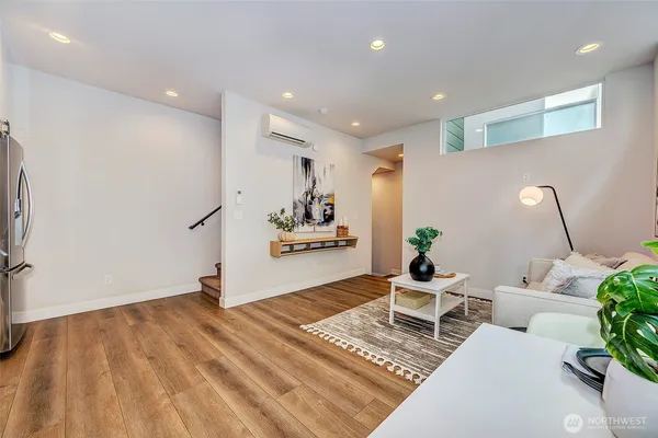 a living room with furniture and a table