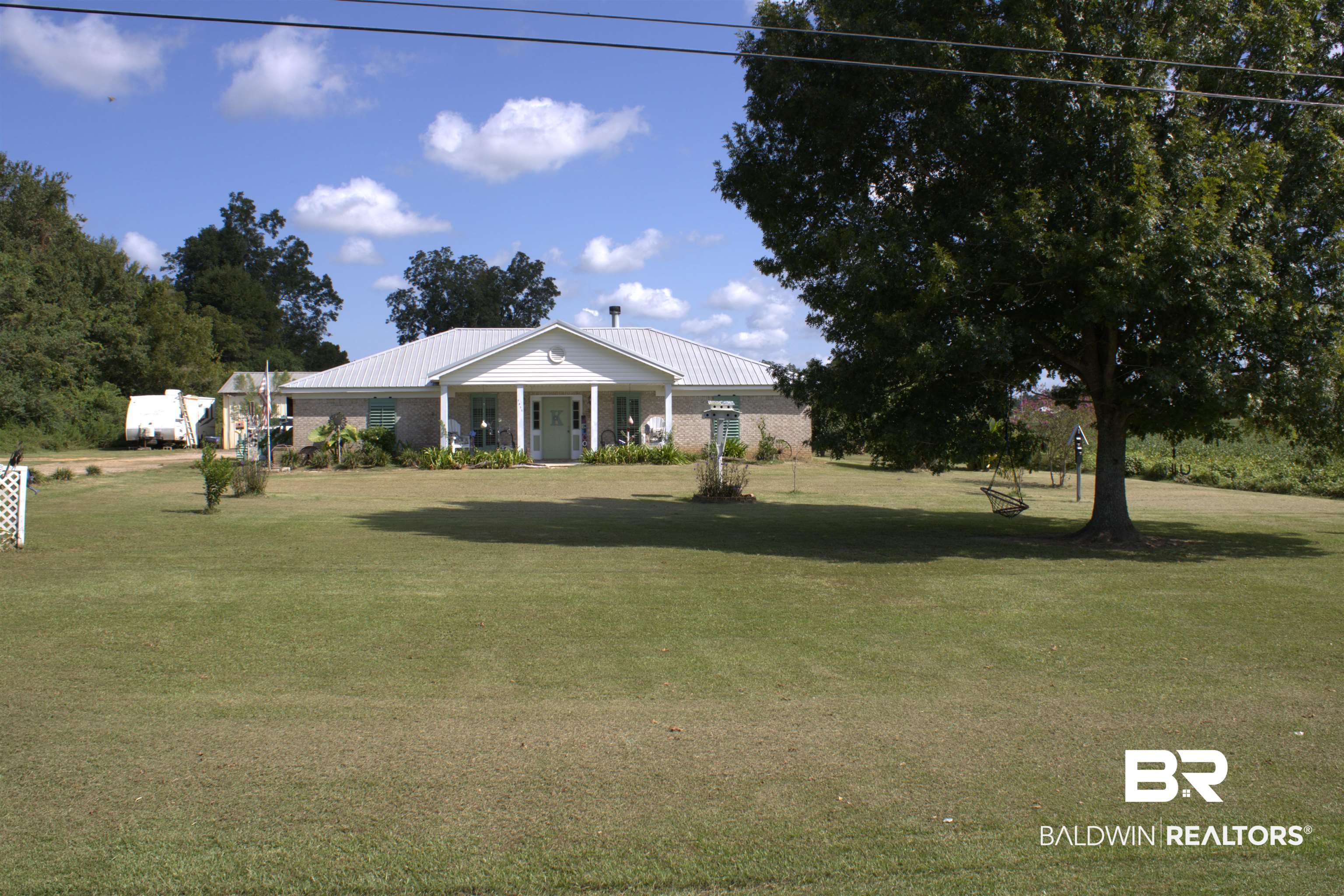 7851 Highway 98 Fairhope, AL 36532 - Photo 1 of 40 View of front of home, lawn and covered porch