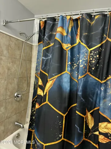 an empty room with a empty space and windows