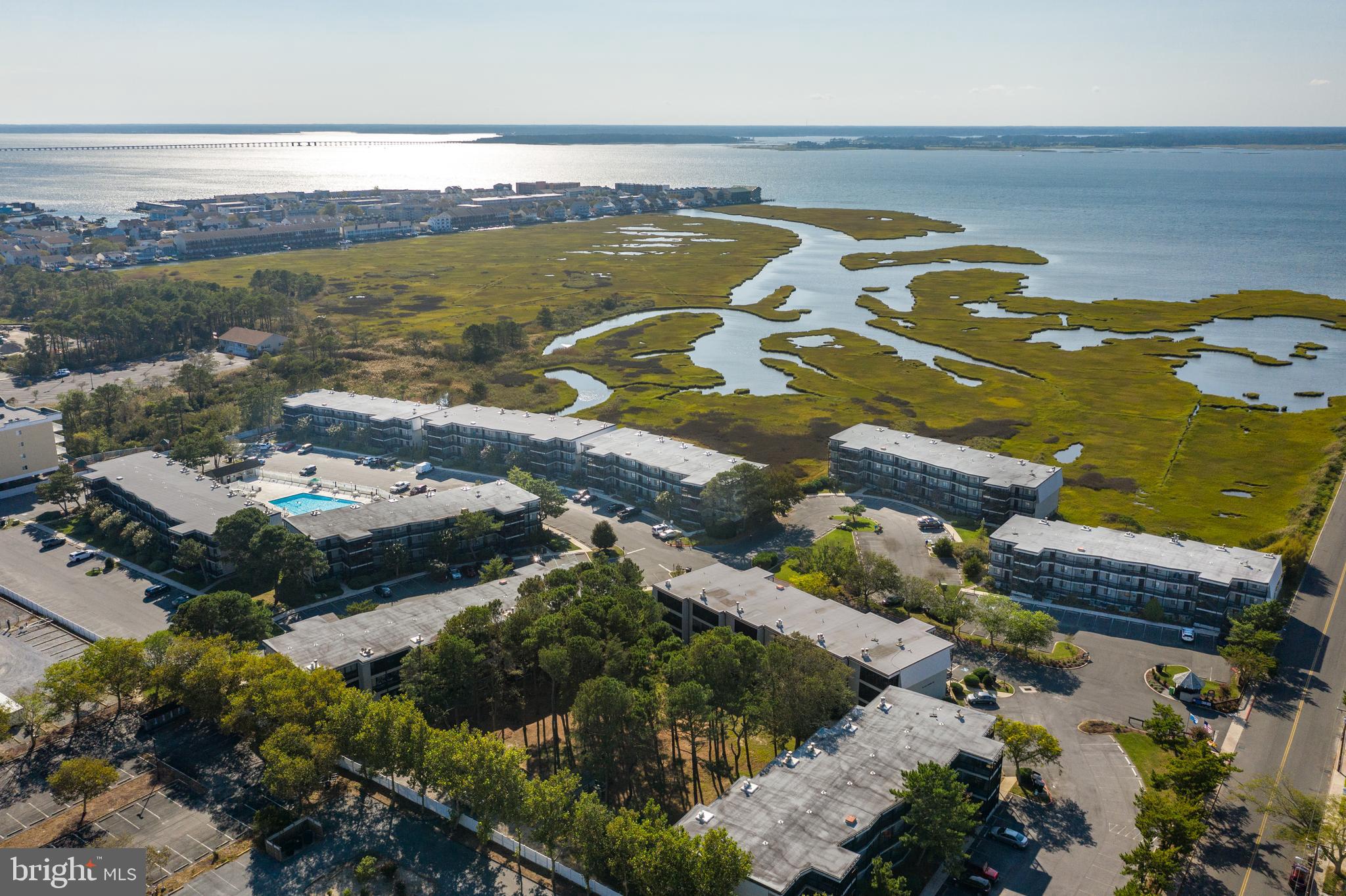 119 Old Landing Road, Unit 302B Ocean City, MD 21842 - Photo 12 of 46 a view of a lake with a mountain