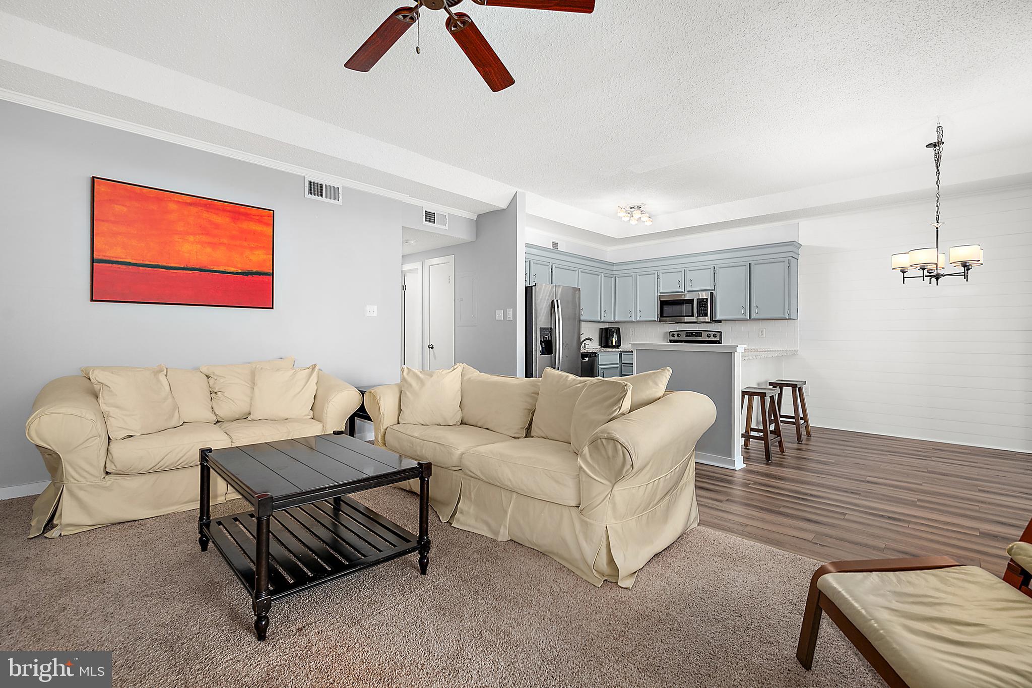 119 Old Landing Road, Unit 302B Ocean City, MD 21842 - Photo 20 of 46 a living room with furniture