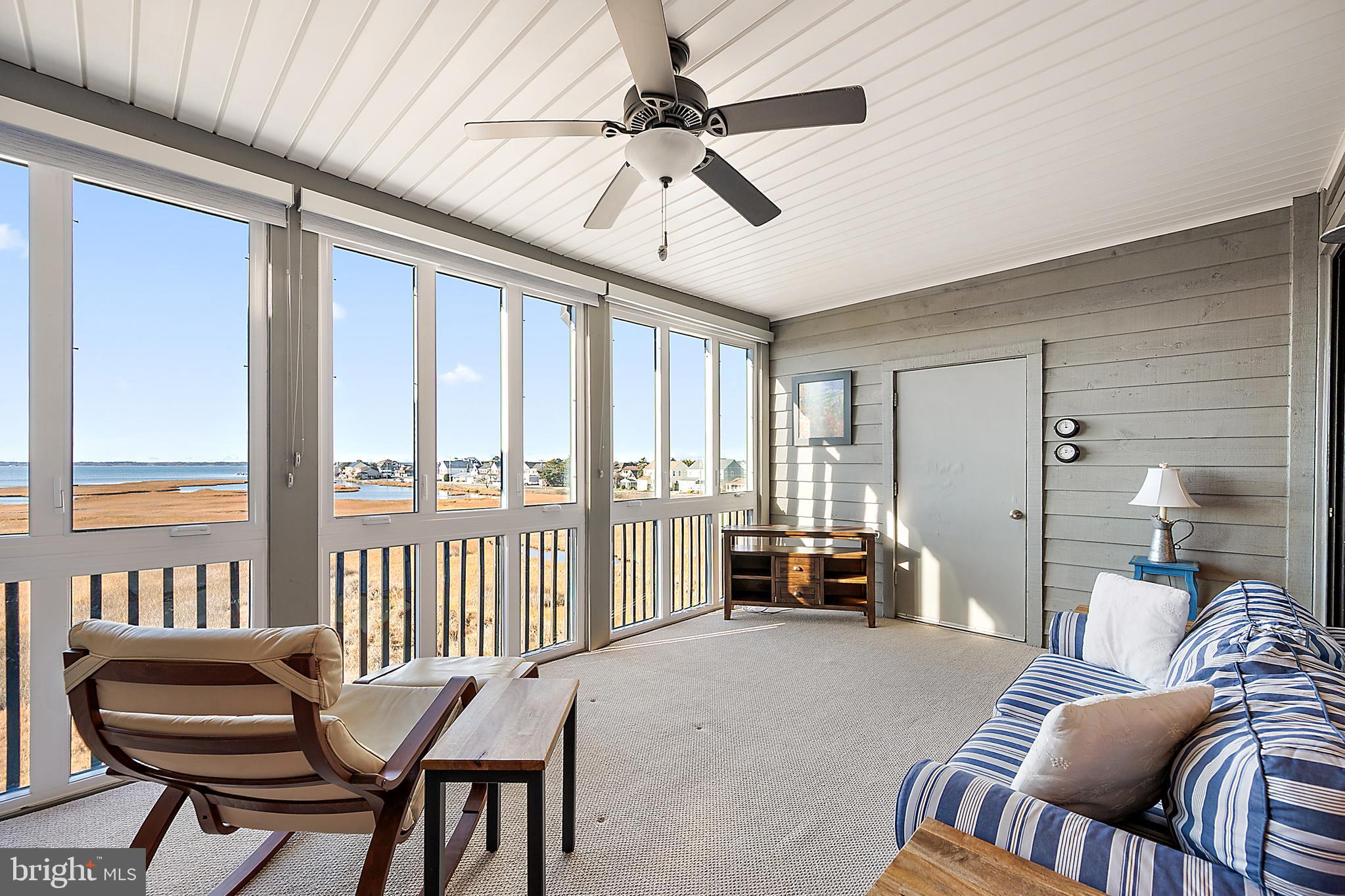 119 Old Landing Road, Unit 302B Ocean City, MD 21842 - Photo 24 of 46 a bedroom with furniture and a large window
