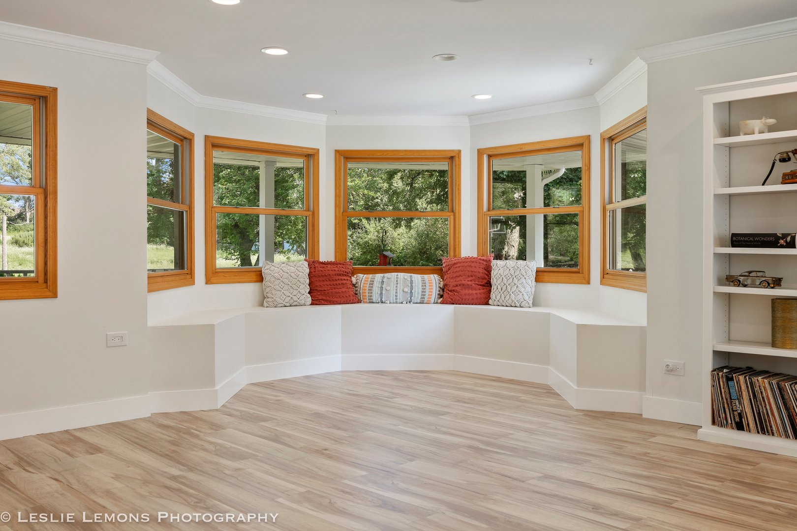 8S452 Bell Drive Naperville, IL 60565 - Photo 18 of 64 a view of an empty room with wooden floor and a window