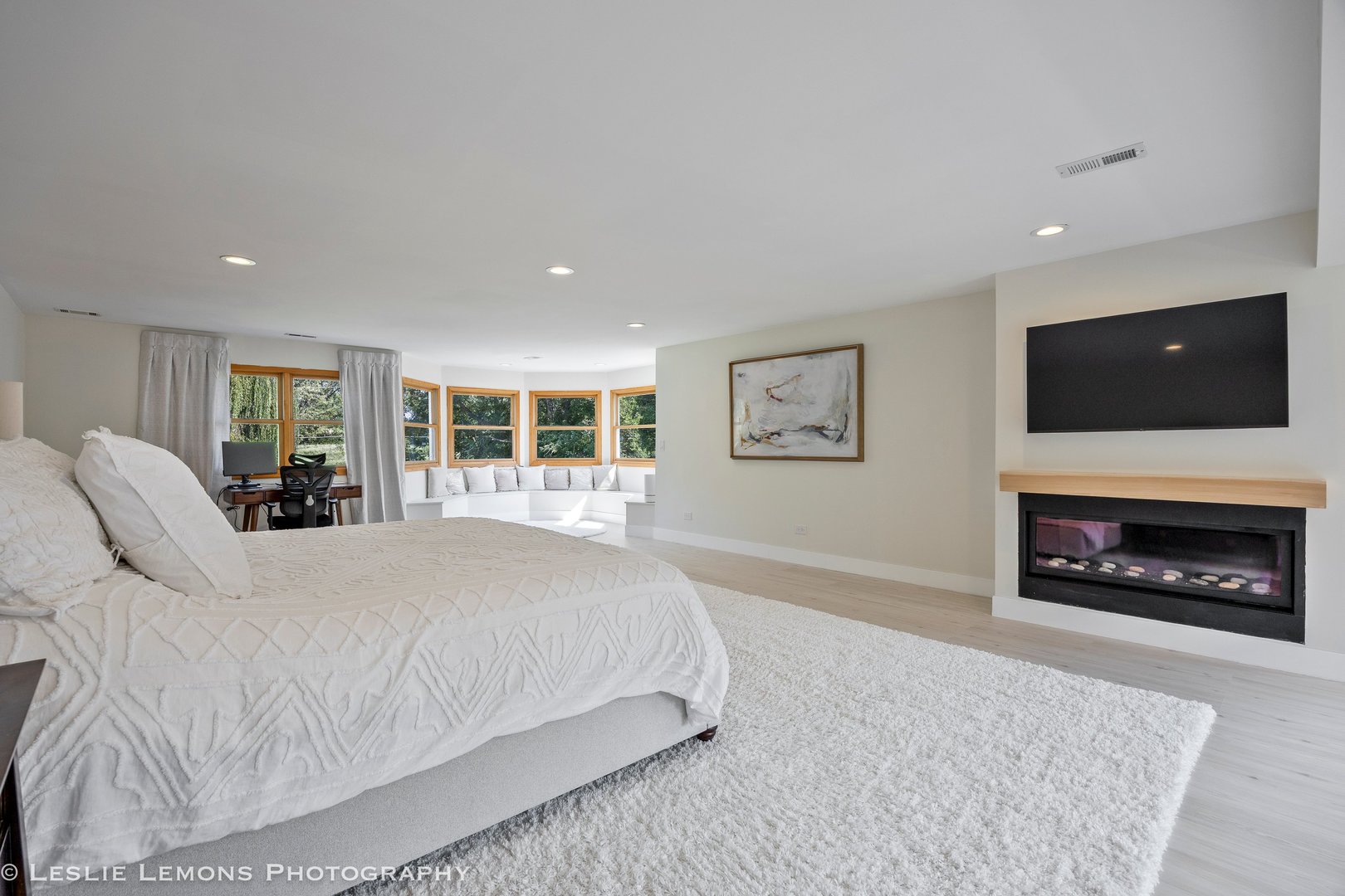 8S452 Bell Drive Naperville, IL 60565 - Photo 28 of 64 a spacious bedroom with a bed and a flat screen tv