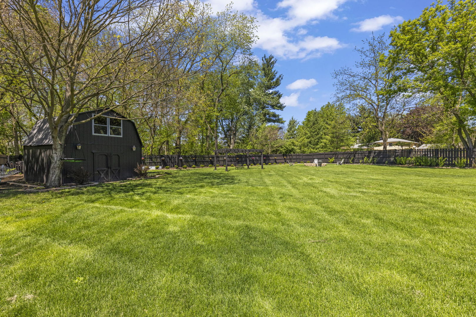 8S452 Bell Drive Naperville, IL 60565 - Photo 48 of 64 a front view of a house with yard and green space