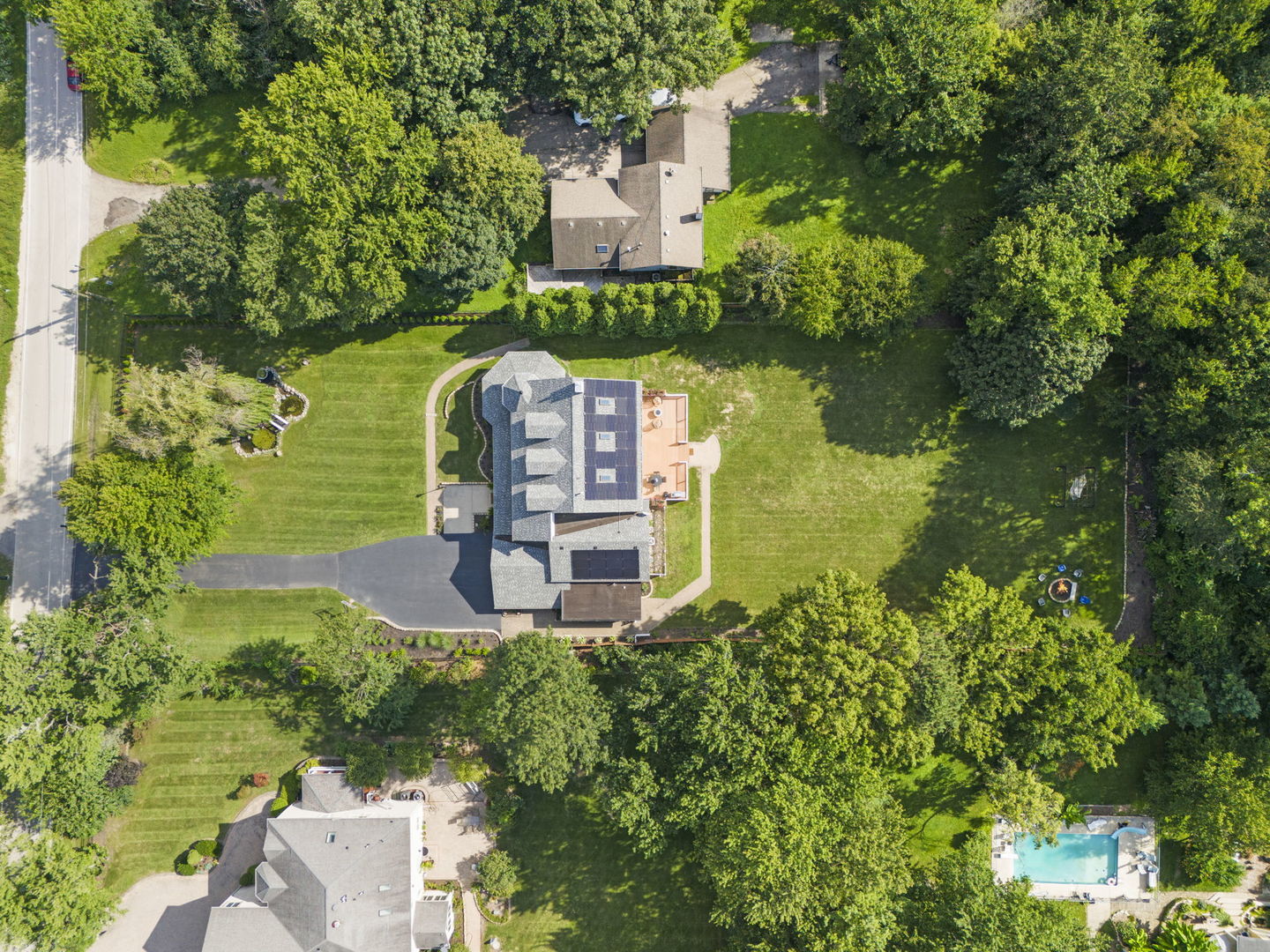 8S452 Bell Drive Naperville, IL 60565 - Photo 51 of 64 an aerial view of a house with outdoor space lake and trees all around
