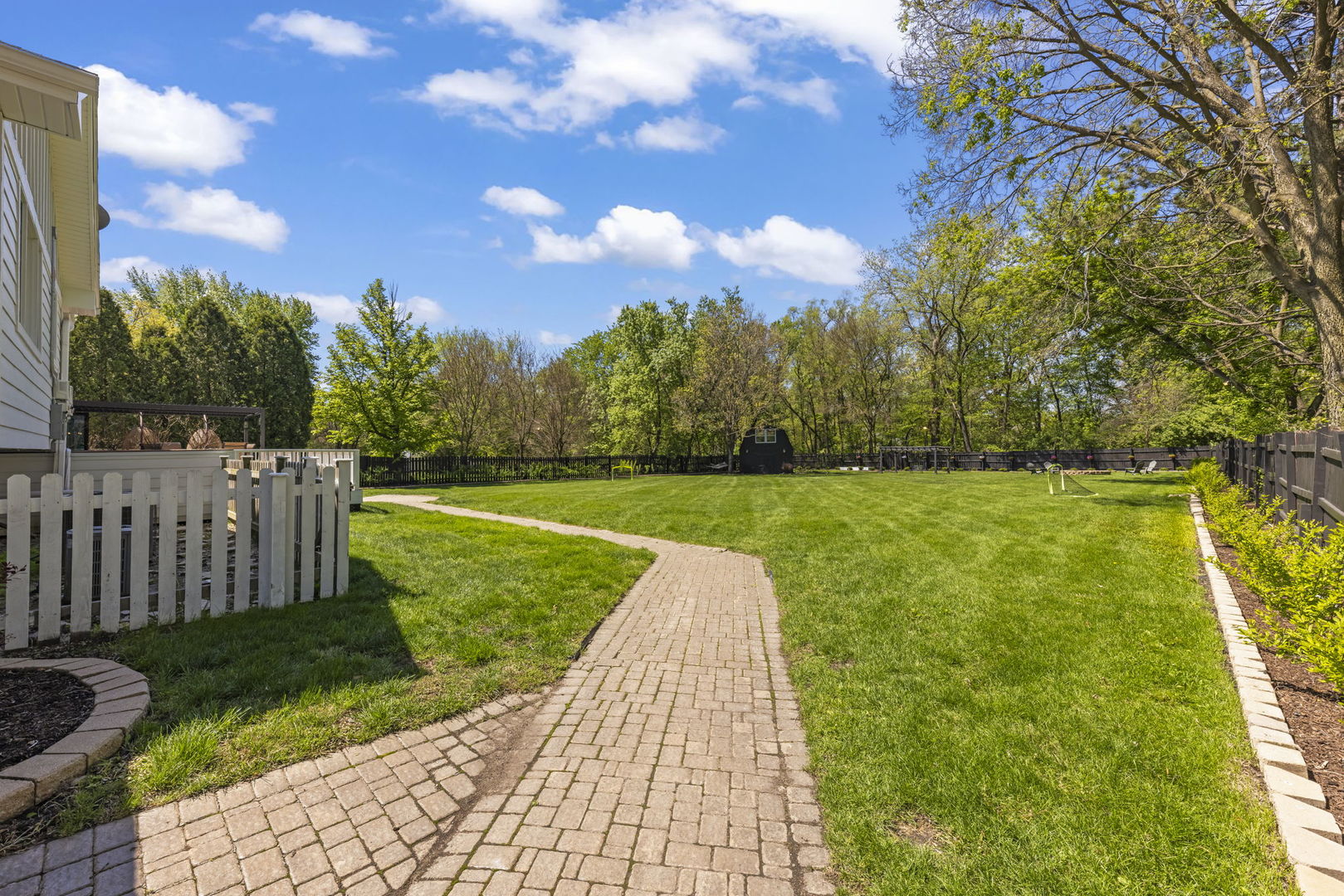 8S452 Bell Drive Naperville, IL 60565 - Photo 55 of 64 a view of a garden with an empty space