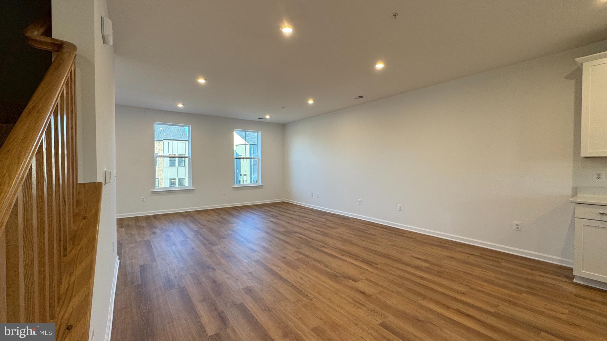 2623 River Birch Road Herndon, VA 20171 - Photo 2 of 12 an empty room with wooden floor and windows