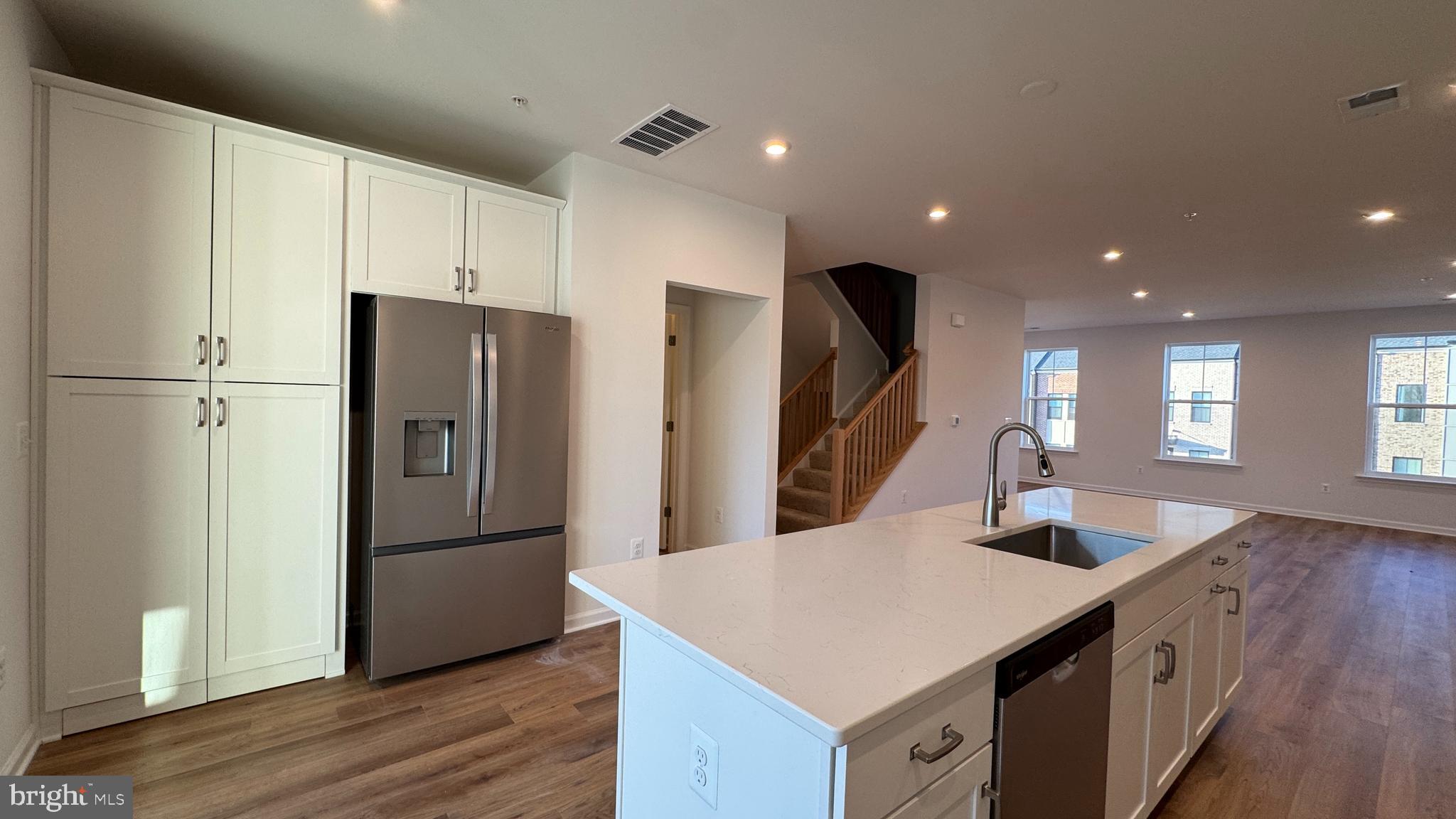 2623 River Birch Road Herndon, VA 20171 - Photo 4 of 12 a kitchen with stainless steel appliances a refrigerator sink and stove