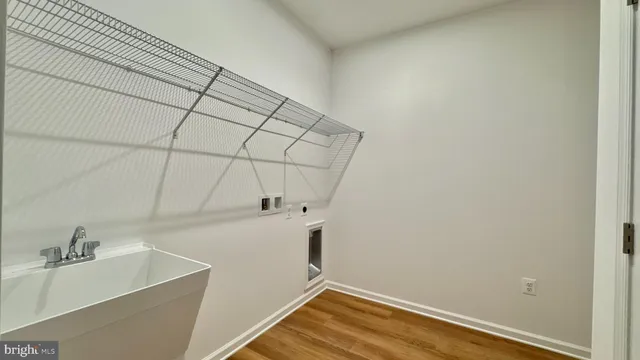 a bathroom with a sink and vanity