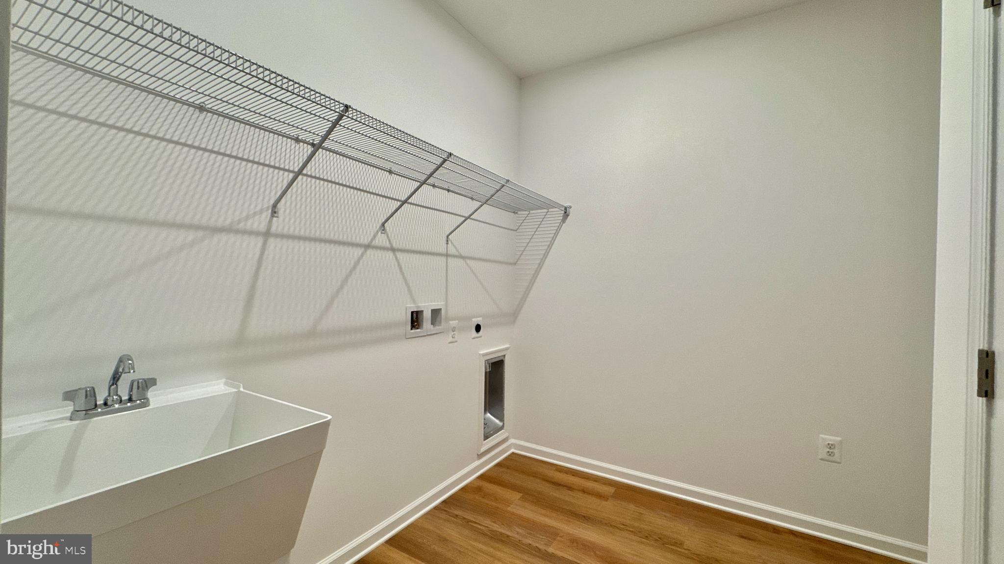 2623 River Birch Road Herndon, VA 20171 - Photo 8 of 12 a bathroom with a sink and vanity