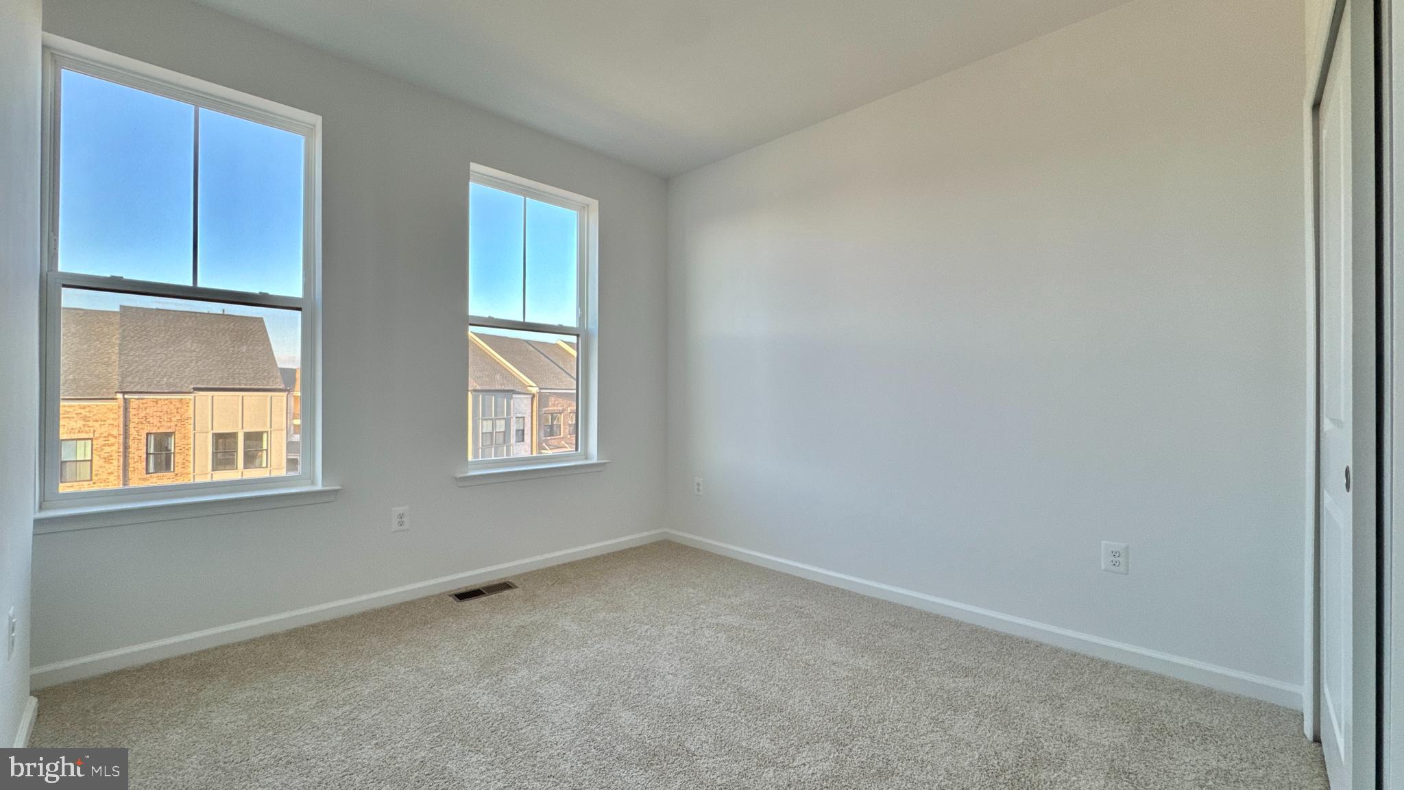 2623 River Birch Road Herndon, VA 20171 - Photo 9 of 12 an empty room with windows