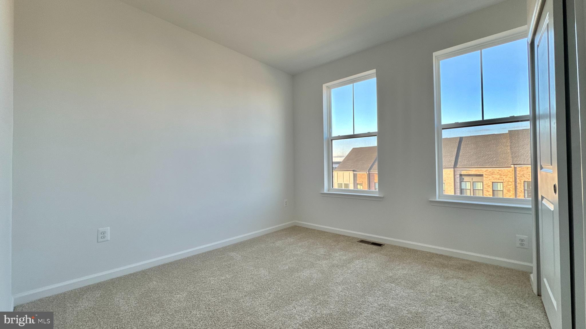 2623 River Birch Road Herndon, VA 20171 - Photo 10 of 12 an empty room with windows