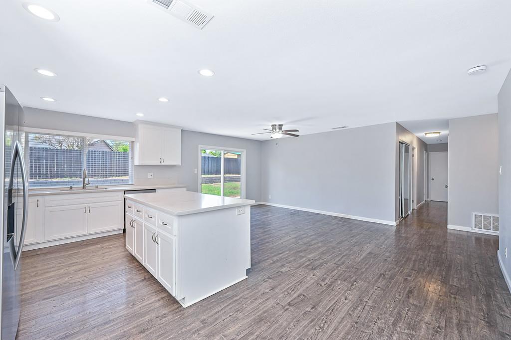 8037 Ruthwood Way Orangevale, CA 95662 - Photo 18 of 37 a kitchen with a stove top oven and cabinets