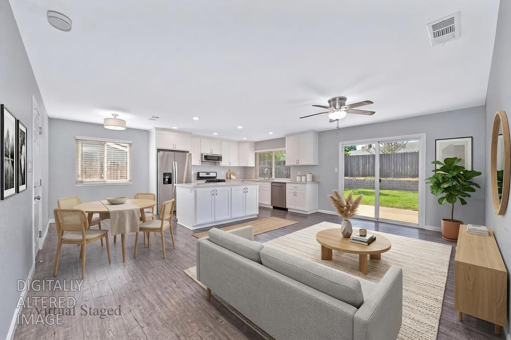 8037 Ruthwood Way Orangevale, CA 95662 - Photo 3 of 37 a living room with furniture and wooden floor