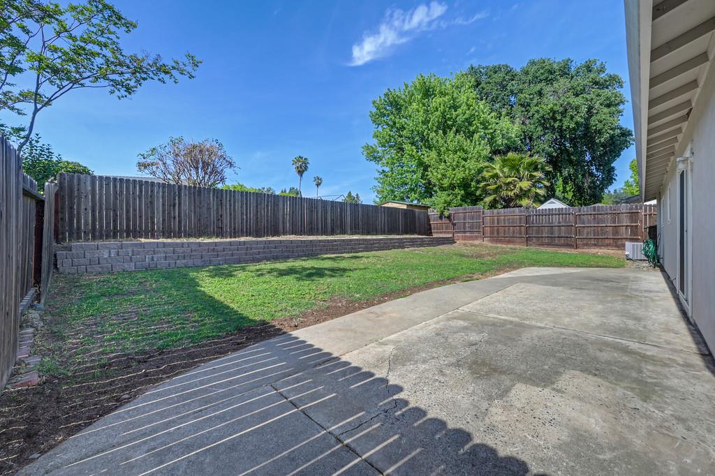 8037 Ruthwood Way Orangevale, CA 95662 - Photo 34 of 37 a view of a backyard with a garden