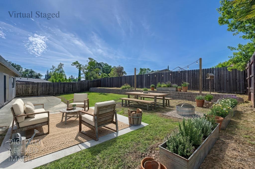 8037 Ruthwood Way Orangevale, CA 95662 - Photo 7 of 37 a view of a chairs in patio and a yard