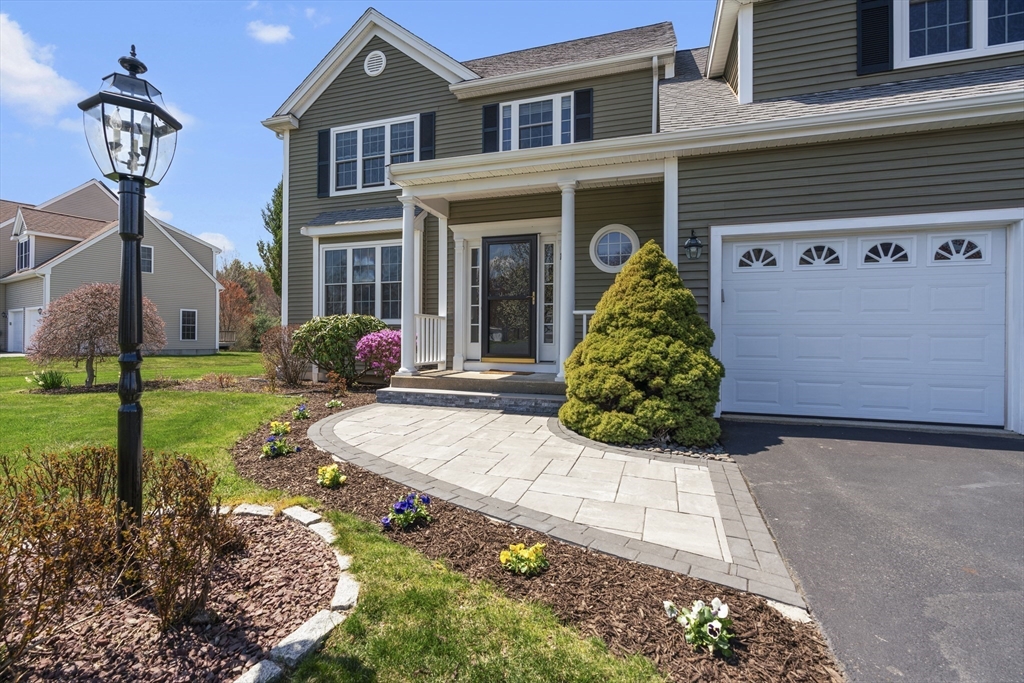 18 Ridgewood Street Ashland, MA 01721 - Photo 1 of 40 a front view of a house