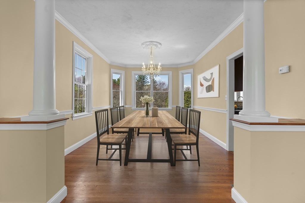 18 Ridgewood Street Ashland, MA 01721 - Photo 12 of 40 a view of a a dining room with furniture window and wooden floor