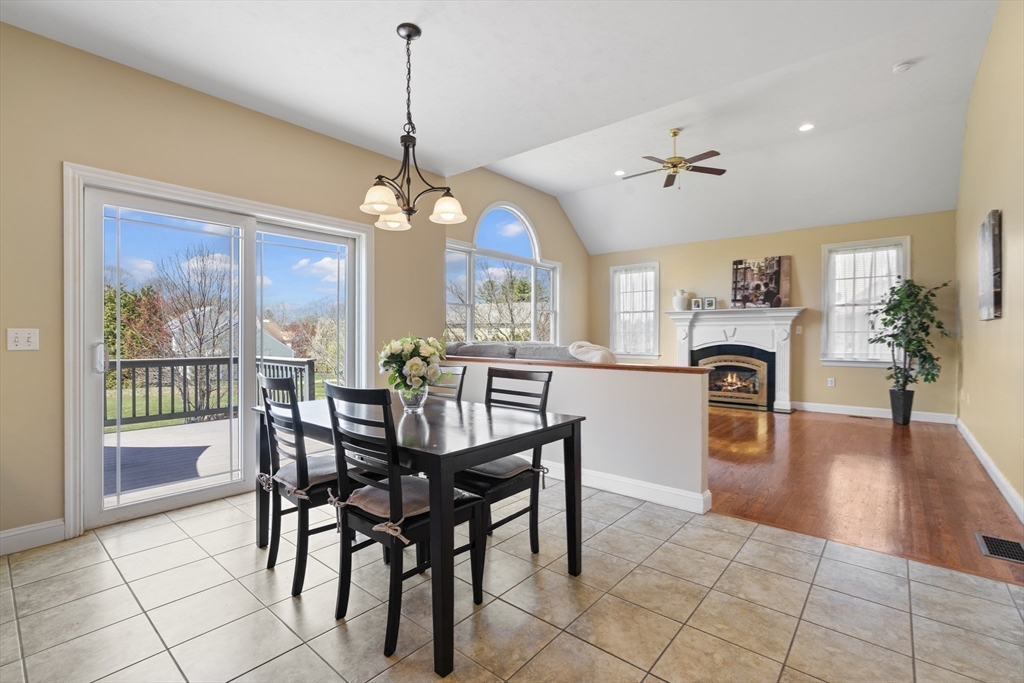 18 Ridgewood Street Ashland, MA 01721 - Photo 20 of 40 a view of a dining room with furniture window and wooden floor